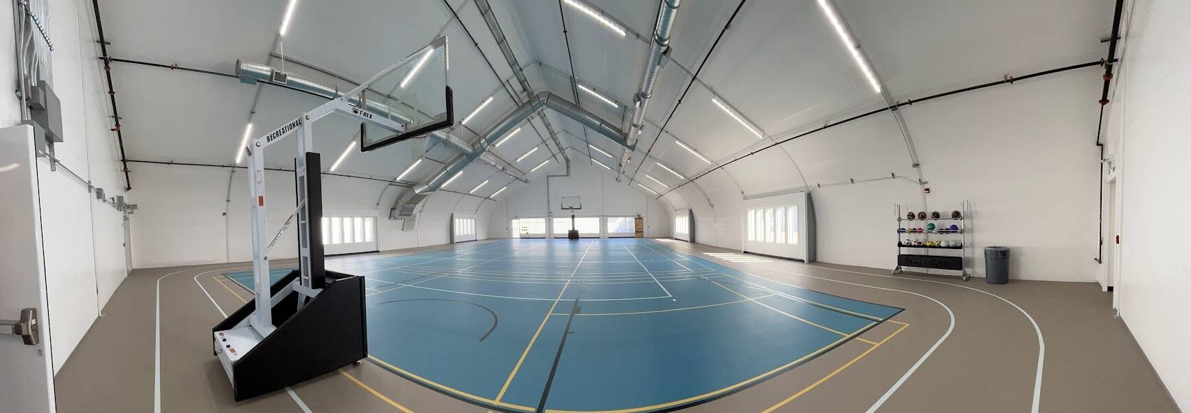 indoor basketball/pickleball court and running track
