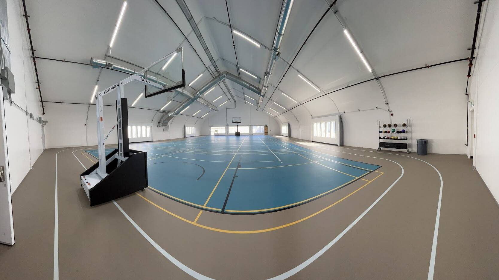 indoor basketball/pickleball court and running track