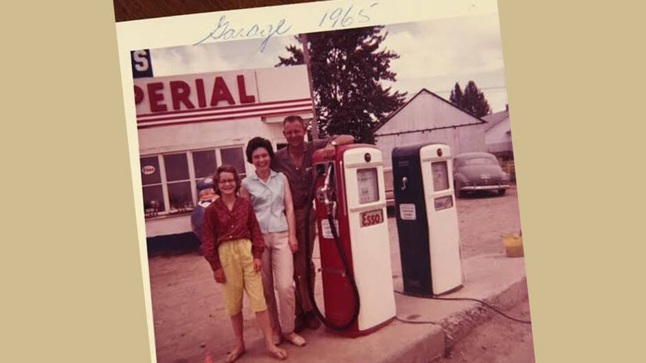 Wes and Fran Teskey, with their daughter, Pat, in front of the service station in Rocky Mountain House, 1965