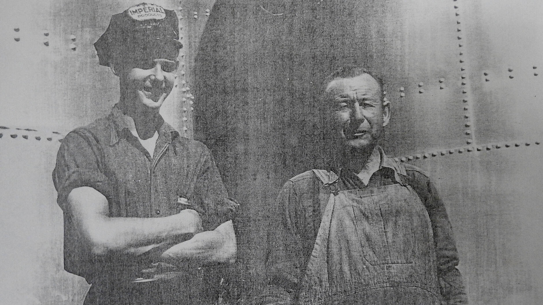 Vickis great-grandpa, William Teskey, and her grandpa, Wes, at the bulk sales yard, late 1940s