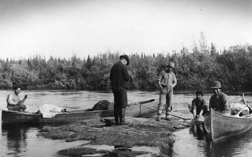 Navigating river boats near Fort Norman, Northwest Territories