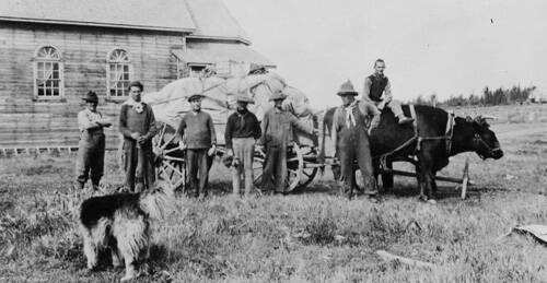 Drilling rig loaded on ox-cart, Fort Fitzgerald, Alberta